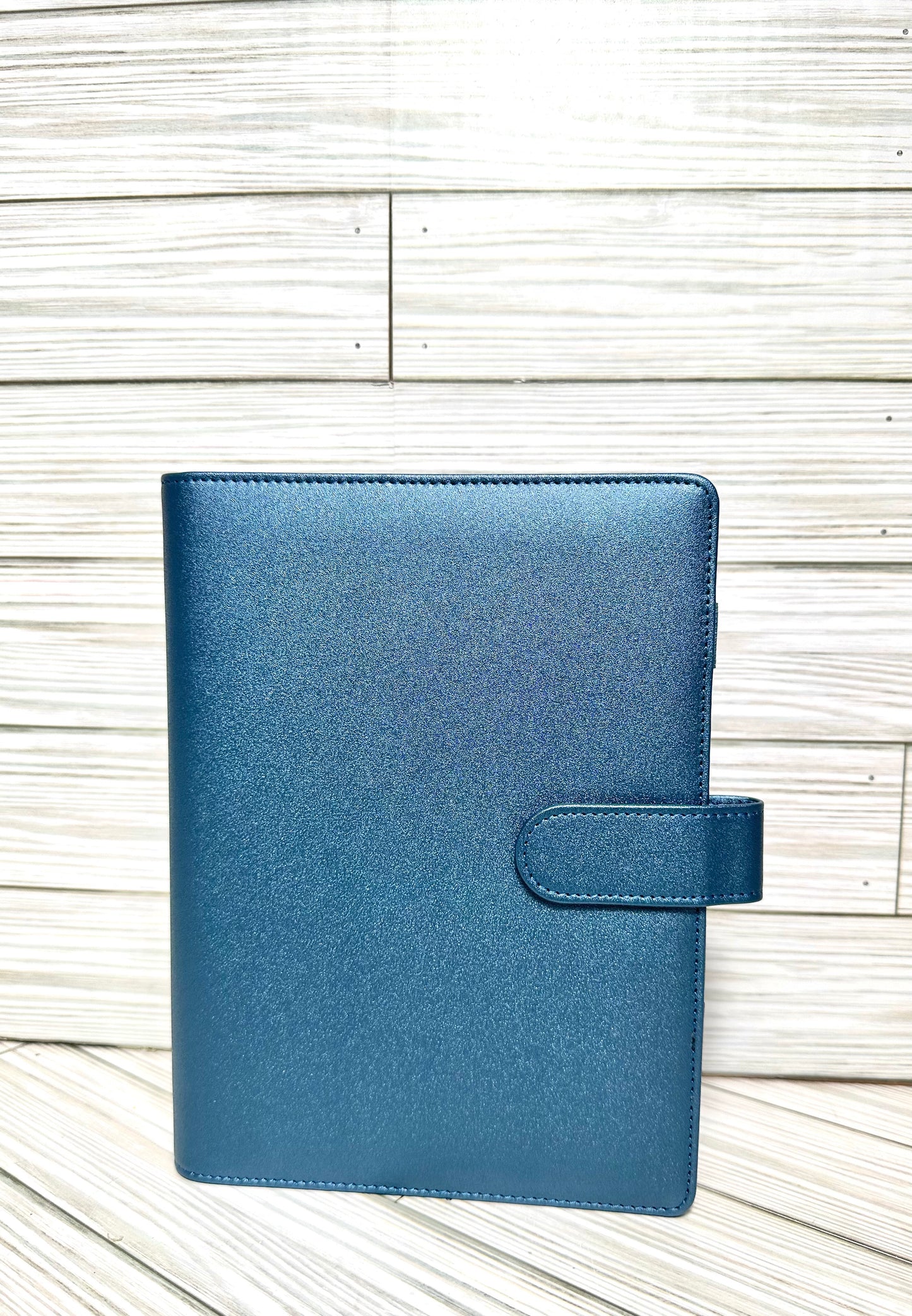 A6 Binders (7.48” lenght by 5.2” width) with your choice of vinyl and rhinestones.