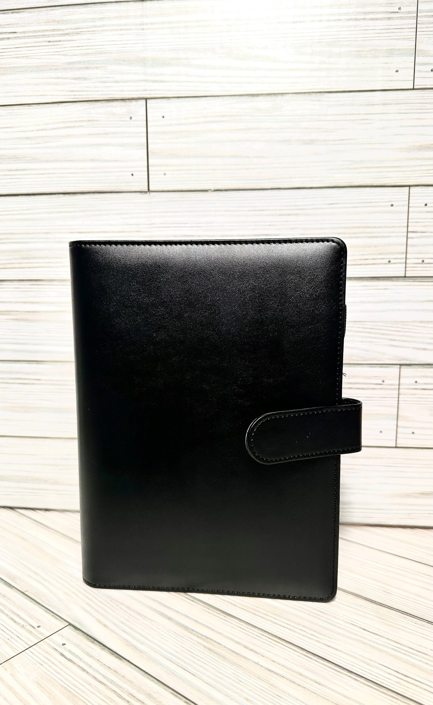 A6 Binders (7.48” lenght by 5.2” width) with your choice of vinyl and rhinestones.