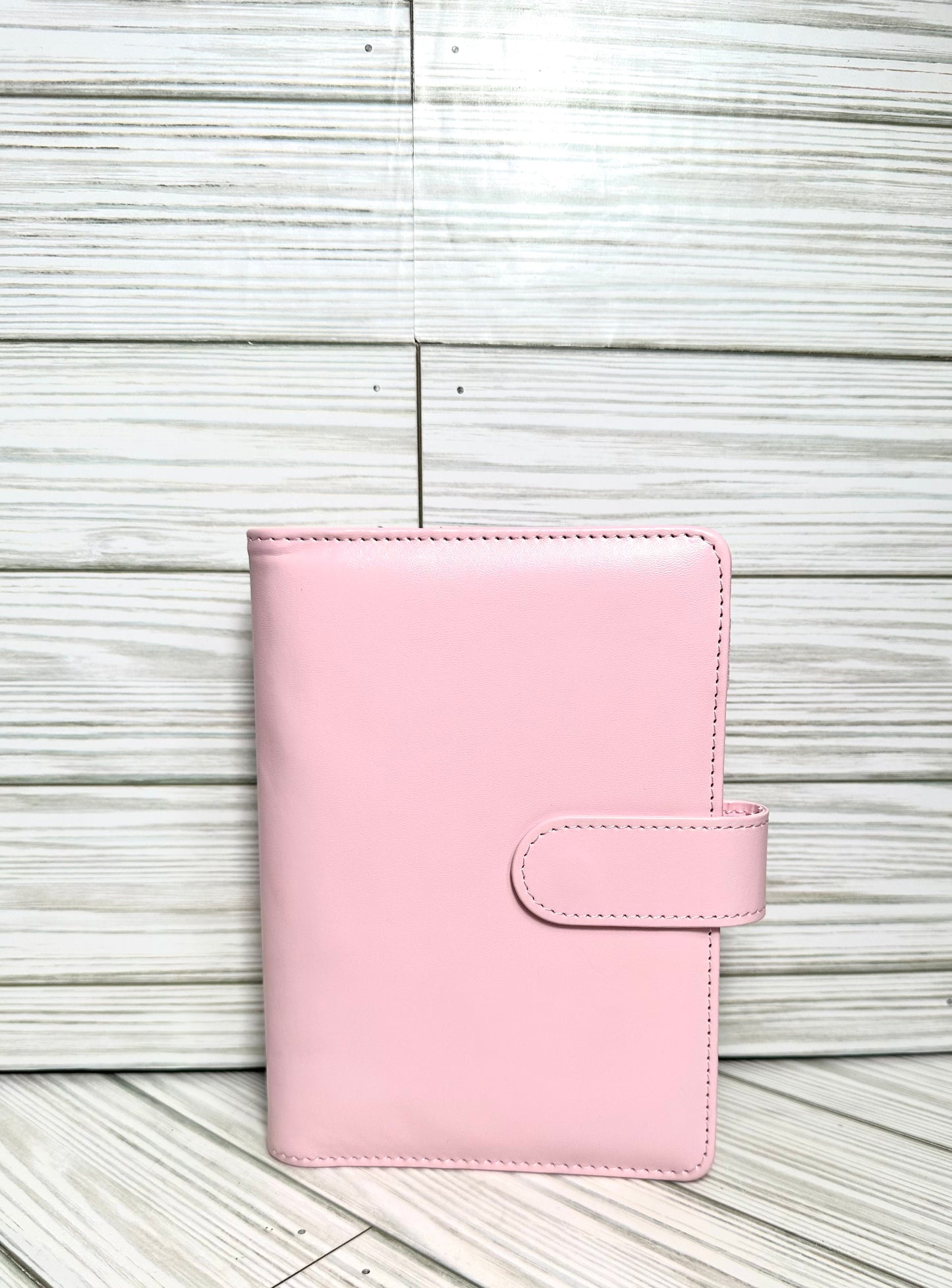 A6 Binders (7.48” lenght by 5.2” width) with your choice of vinyl and rhinestones.