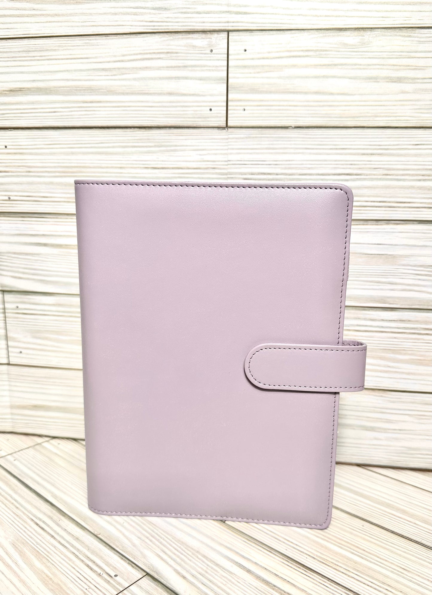 A6 Binders (7.48” lenght by 5.2” width) with your choice of vinyl and rhinestones.