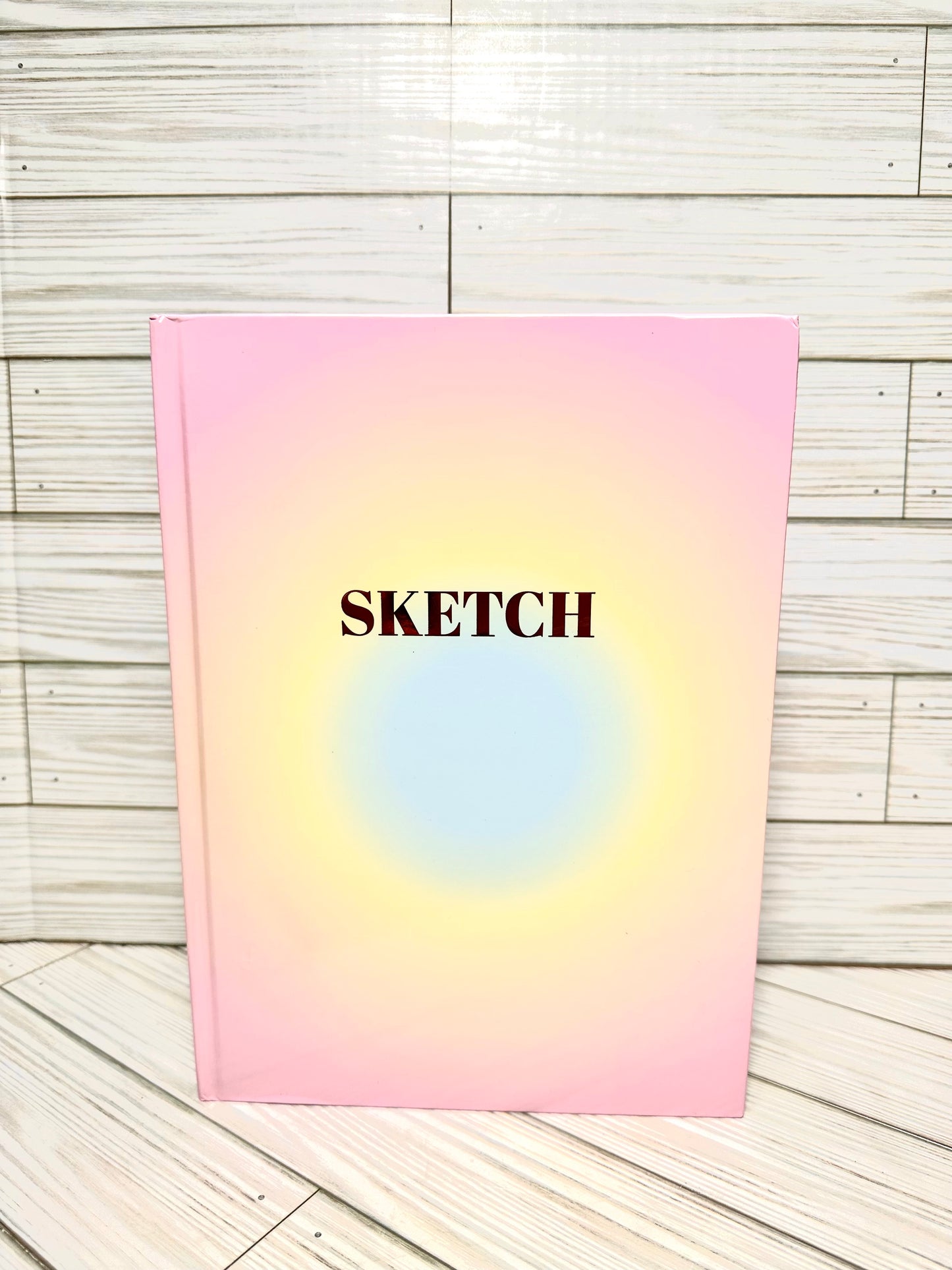 Sketch book 12” in x9” in .Blank drawing paper inside.