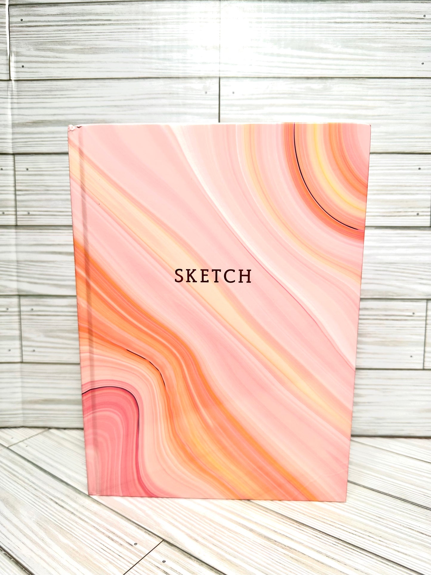 Sketch book 12” in x9” in .Blank drawing paper inside.